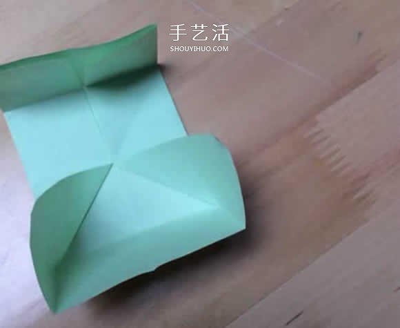 旋转纸陀螺怎么折图解 简单花型陀螺折纸教程(图8)