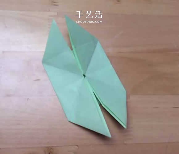 旋转纸陀螺怎么折图解 简单花型陀螺折纸教程(图15)