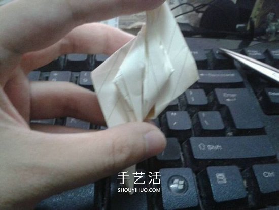 珠光海螺怎么折的教程 手工折纸海螺的步骤图(图32)