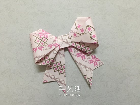 彩纸折蝴蝶结的方法 漂亮蝴蝶结手工折纸图解(图5)