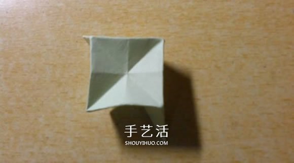 镂空纸花球怎么折图解 简单手工花球的折法(图11)