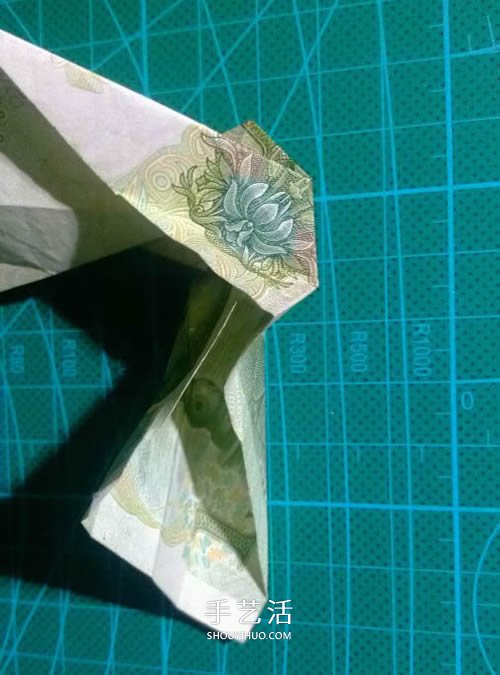 六角徽章的折法图解 一元纸币折纸六角徽章(图12)