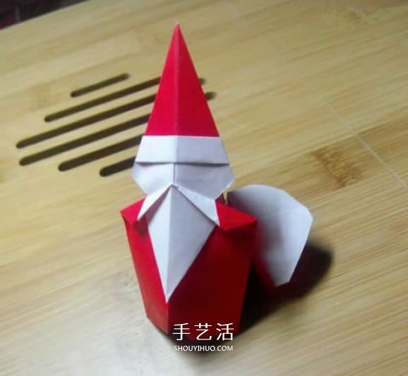 背着麻袋的可爱圣诞老人手工折纸图解教程 - 双维造物网