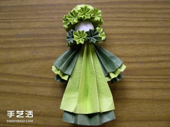 折纸娃娃的制作方法 穿裙子娃娃的折法图解 - 双维造物网